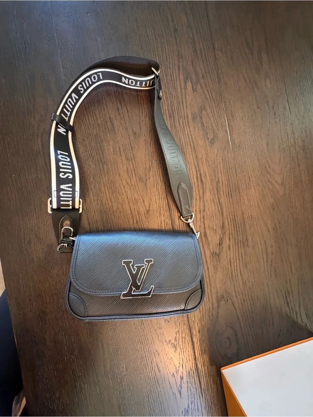 Brand new Louis Vuitton Black Buci bag with 2 Louis Vuitton straps.